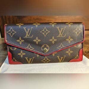 Louis Vuitton Monogram Wallet with Red Trim Retiro